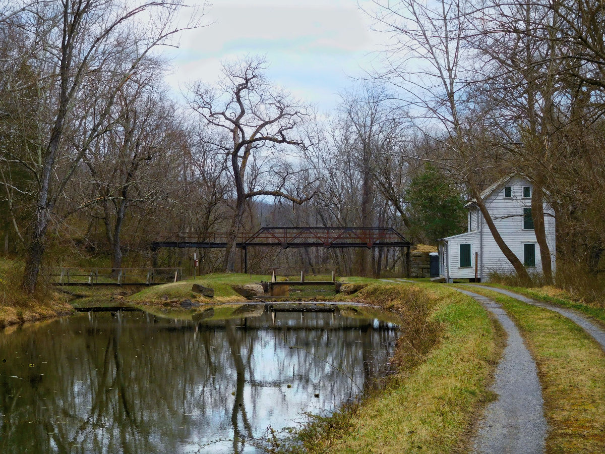 The C and O canal. Lock and Lock House 68 with iron bridge from old Maryland route 51. Mile 164.82.